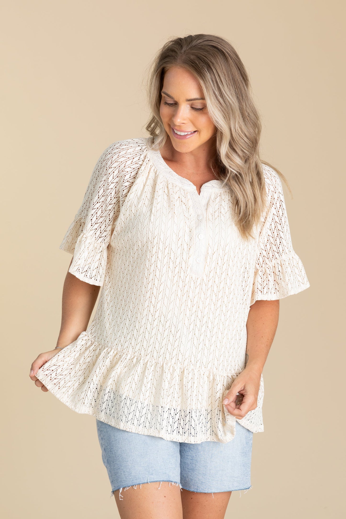 Cream Ruffled V-Notched Crochet Peplum Top
