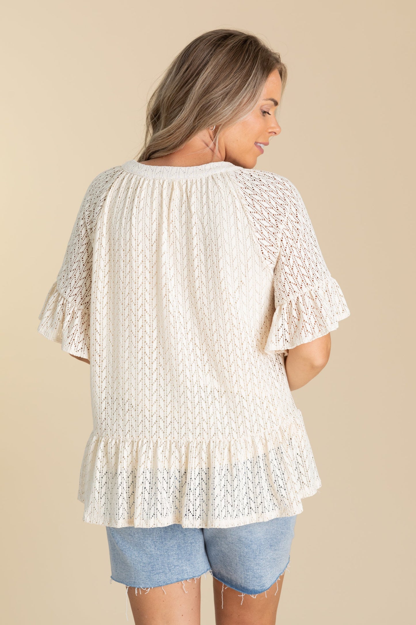 Cream Ruffled V-Notched Crochet Peplum Top