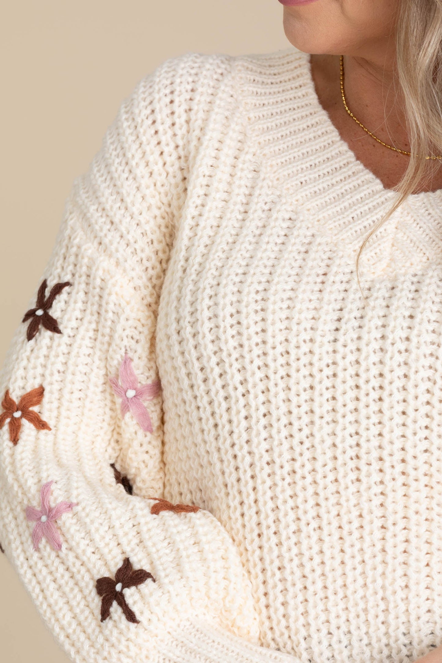 Cream V-Neck Sweater With Flower Detail