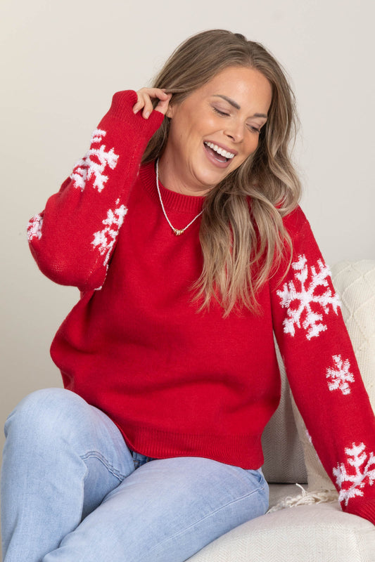 Red Sweater With Snowflake Sleeves
