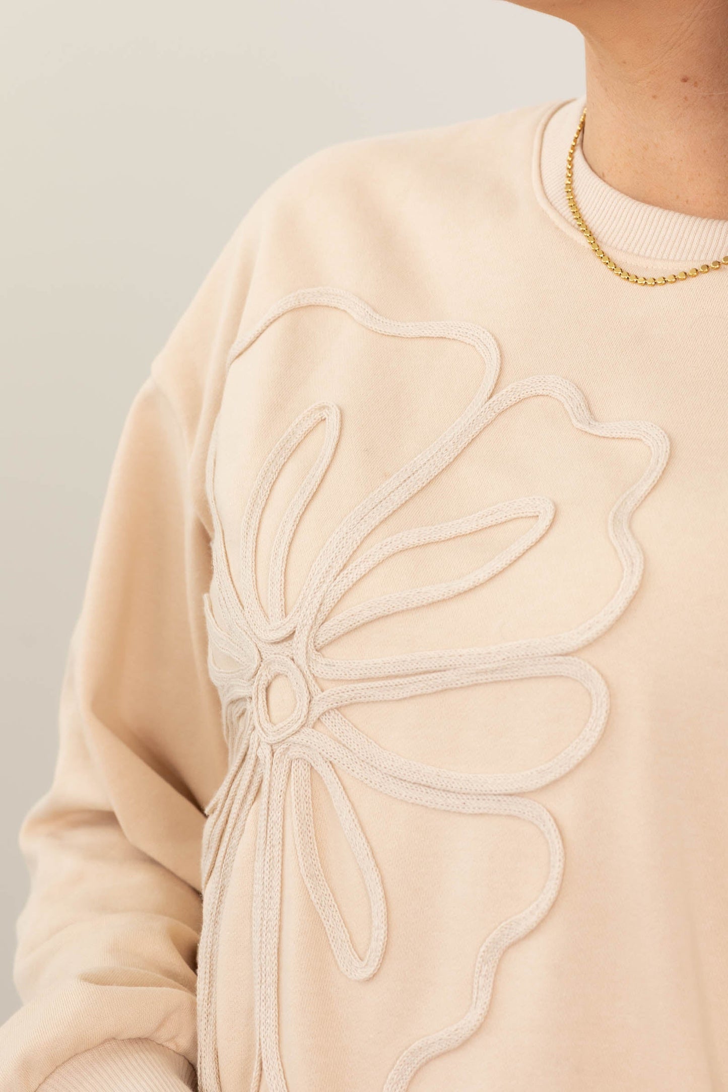 Tan Top With Embroidered Flower Detail