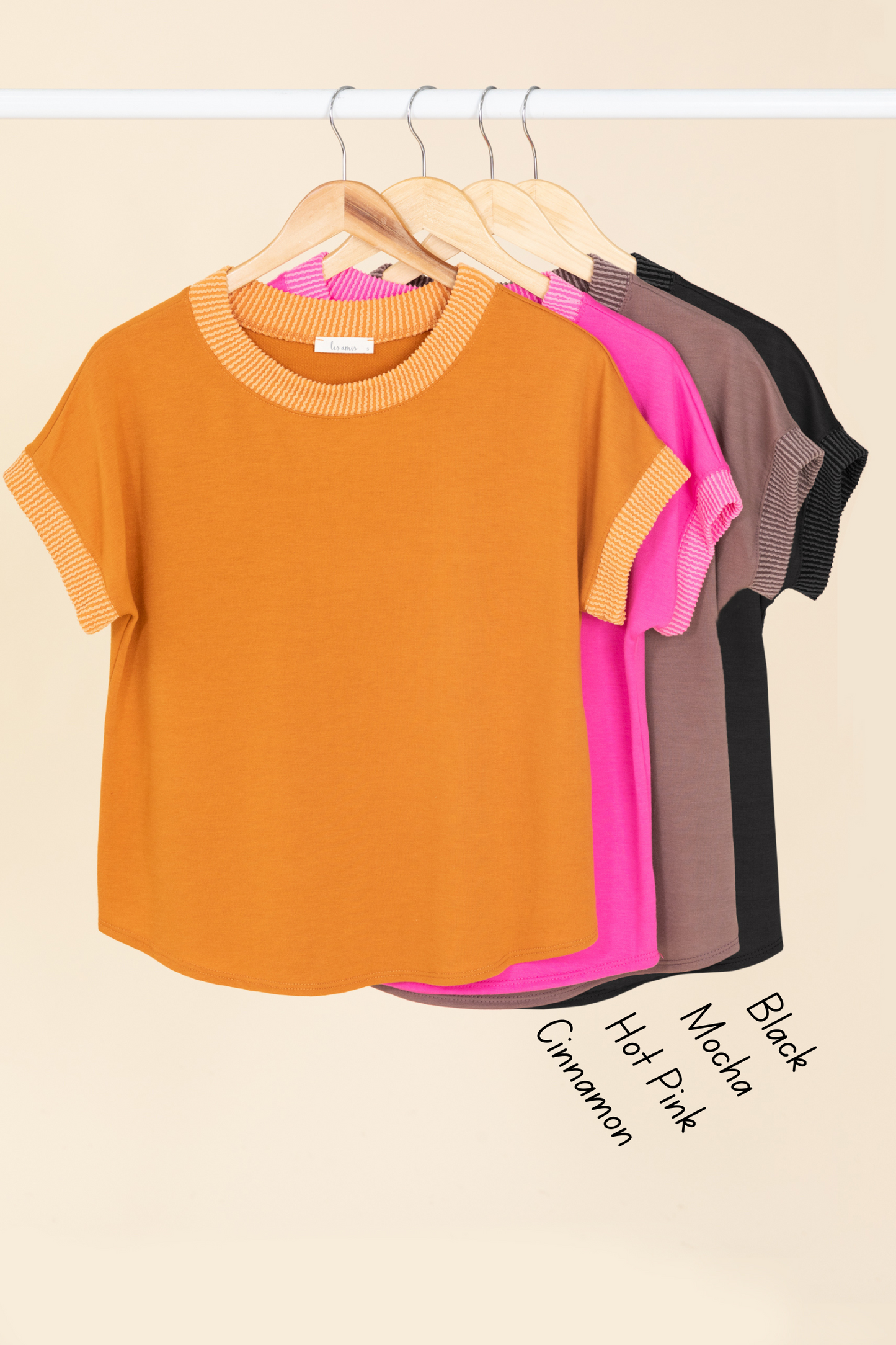 Solid Top With Ribbed Neck And Sleeve Detail